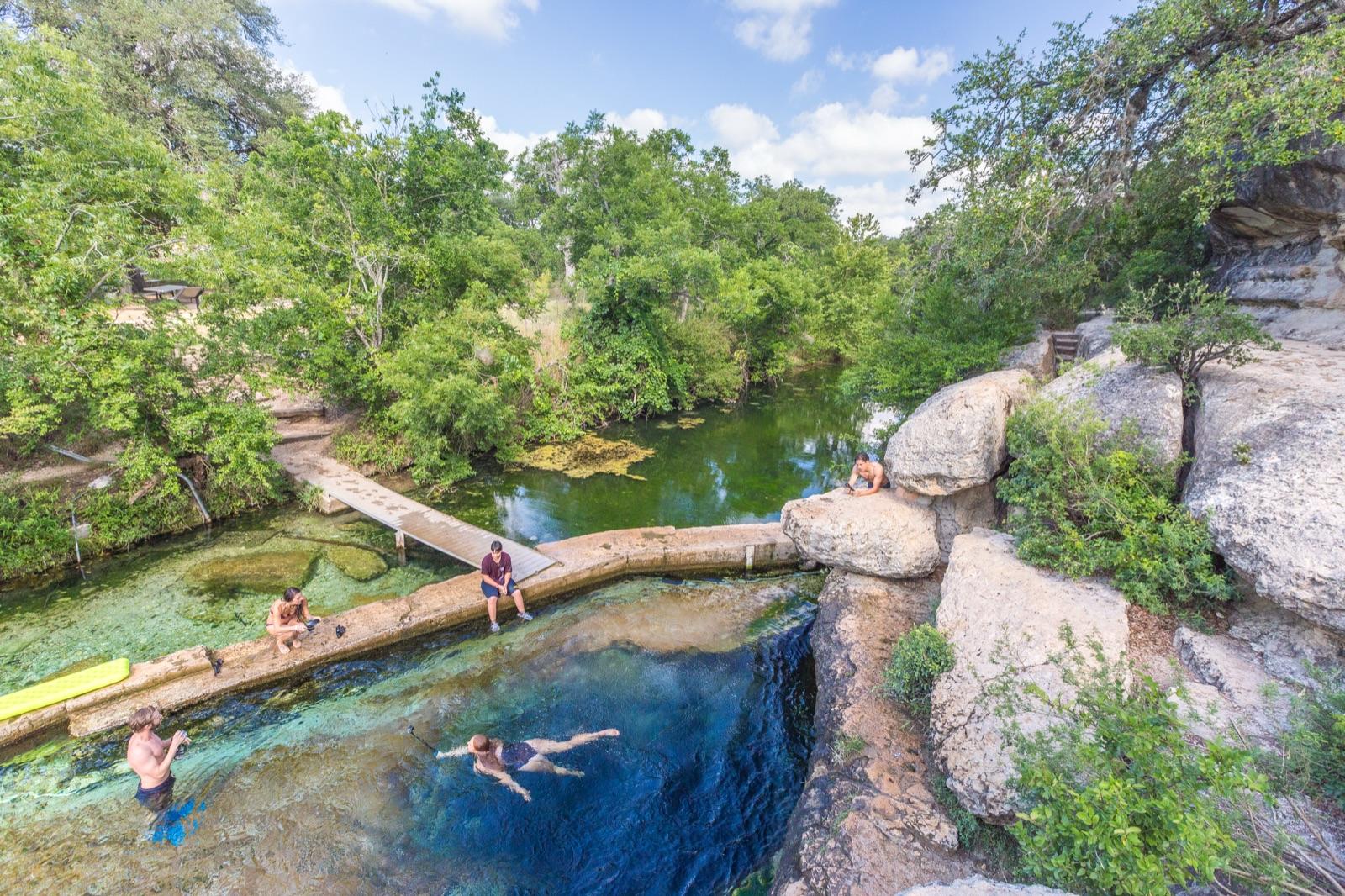 The clear spring opening at Jacob’s Well Natural Area